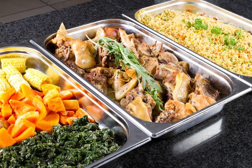 buffet style food in trays